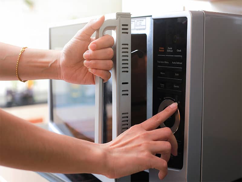 Closing Microwave Oven Door