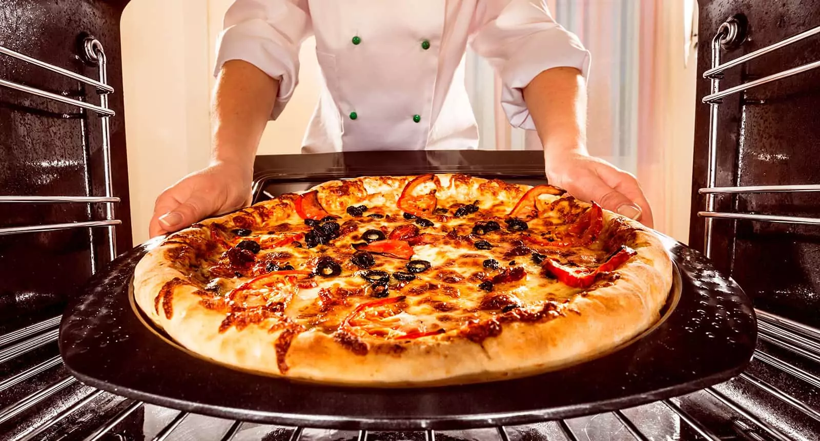 Chef Prepares Pizza