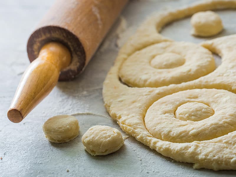 Cutting Fresh Dough Yummy Donuts