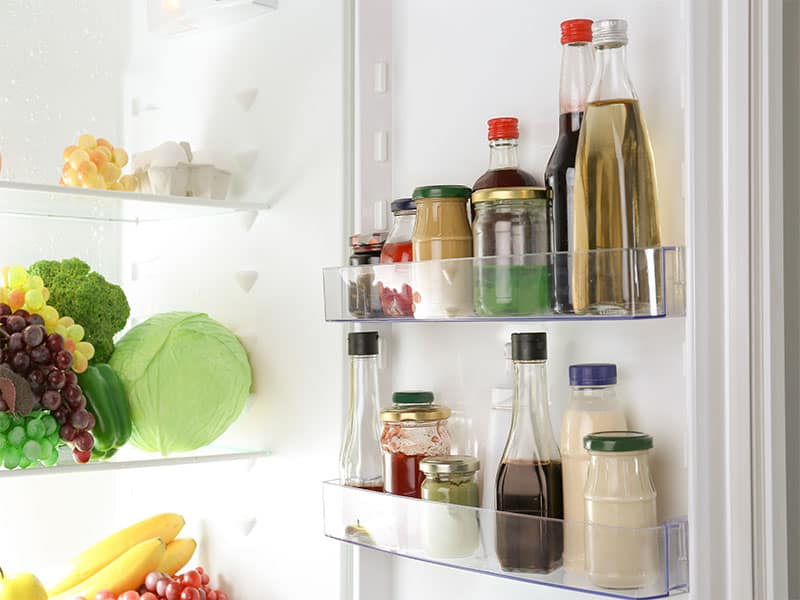 Different Sauces On Shelves Fridge