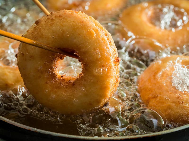 Frying Homemade Sweet Donuts