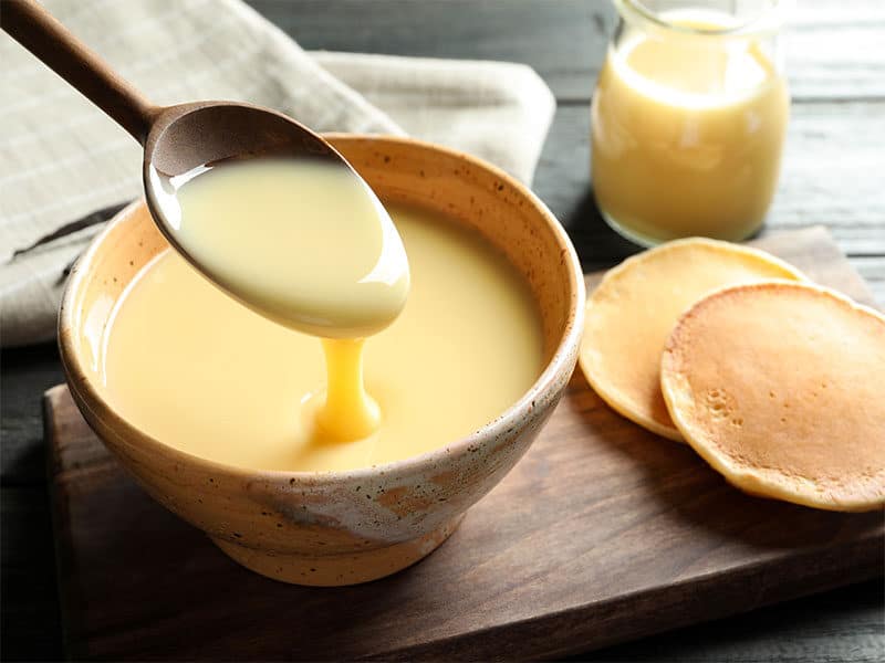 Spoon Pouring Condensed Milk