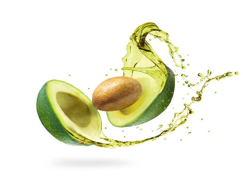 Sliced Avocado Splashes Isolated