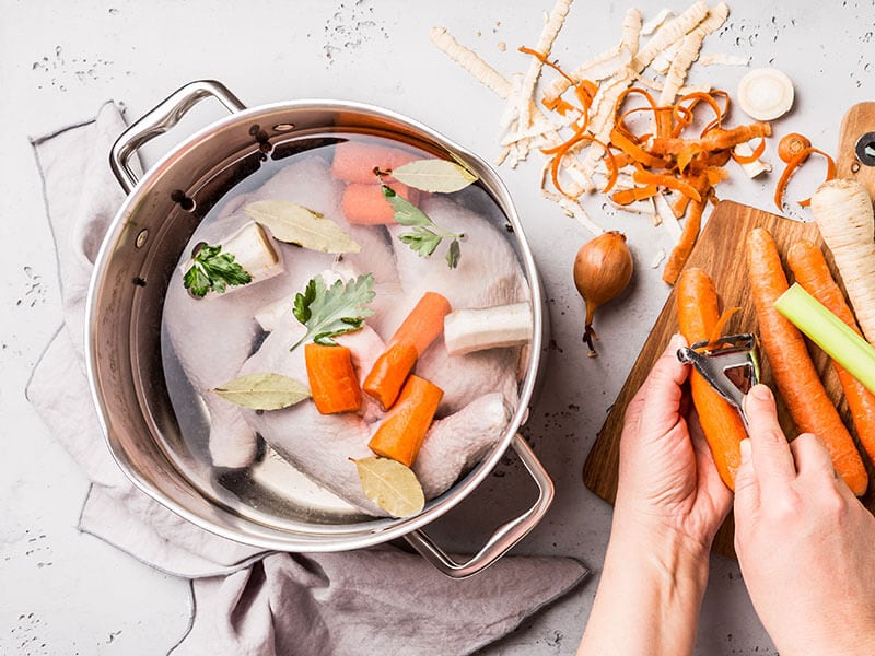 Chefs Hands Preparing Chicken