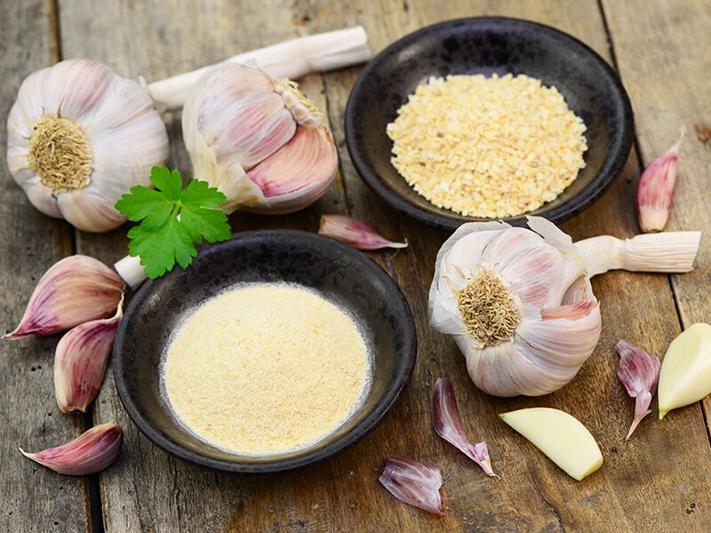 Garlic Cloves on Wooden Table