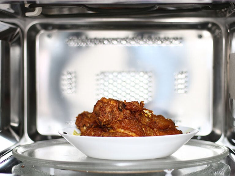 Fried Chicken Dish Inside Microwave Oven