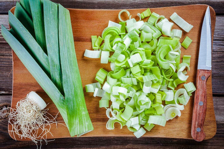 Raw Organic Leek On Wooden