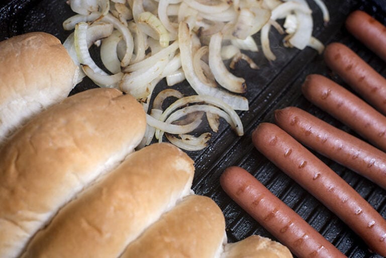 Hot Dog Ingredients On Griddle