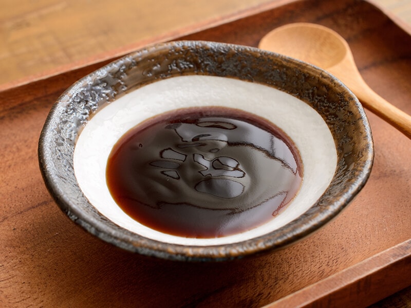 Oyster Sauce In Bowl With Spoon