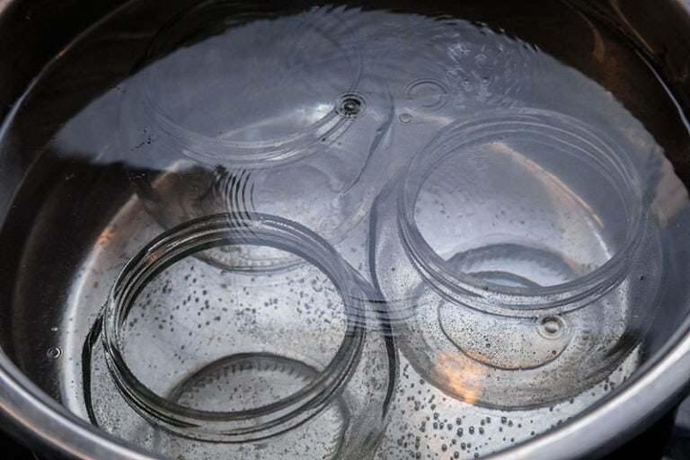 Three Glass Cans Sterilising