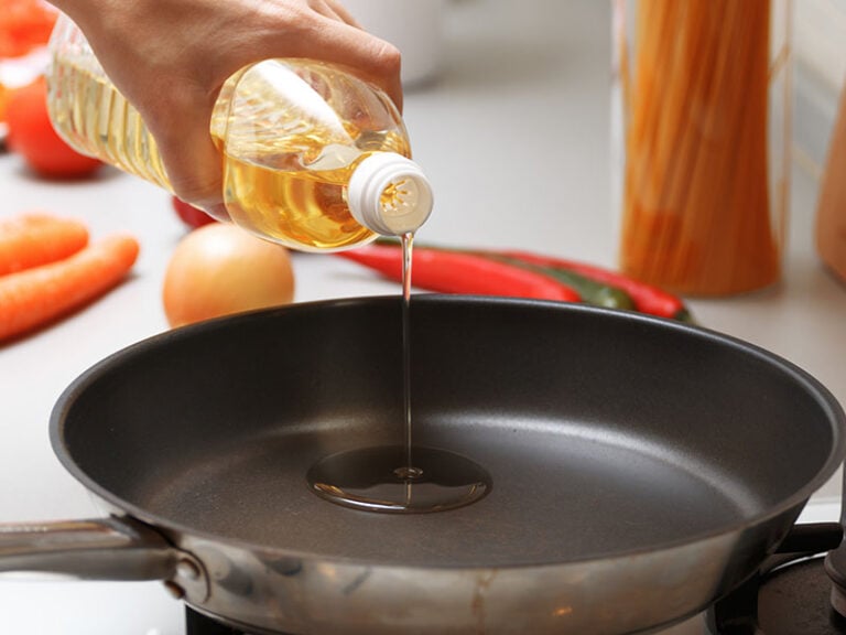 Cooking Woman Pouring Oil