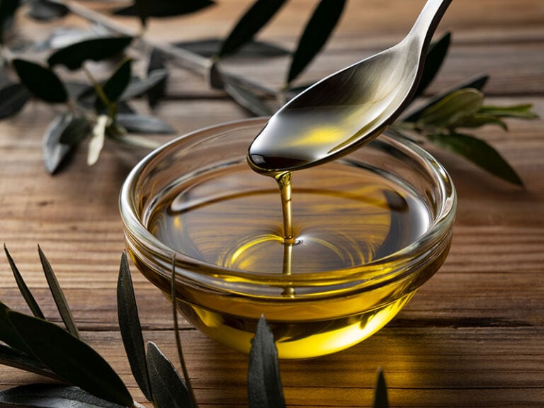 Spooning Olive Oil
