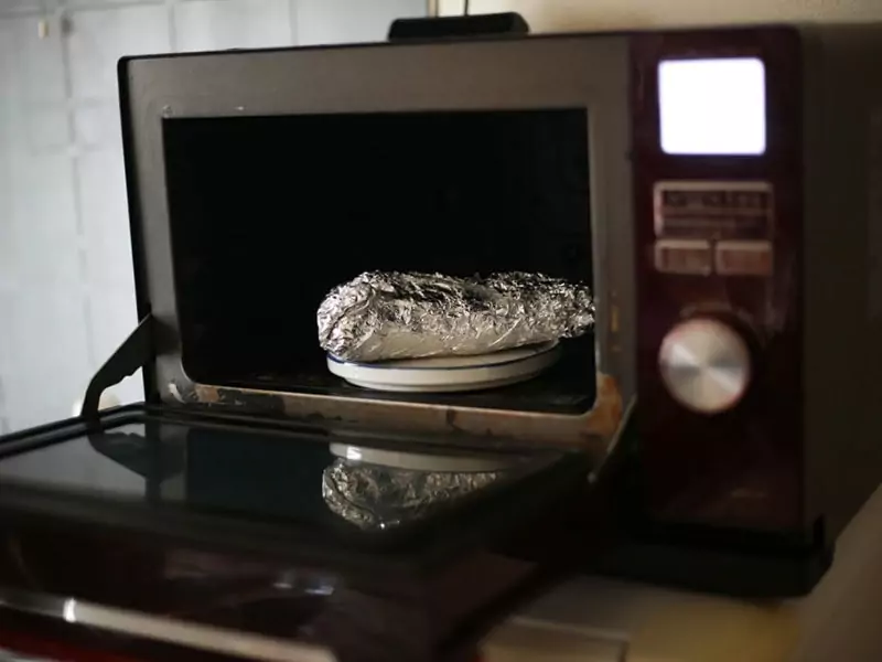 Sweet Potato Wrapped In Aluminum Foil