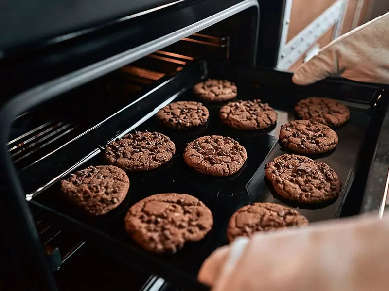 Taking Out Baking Sheet