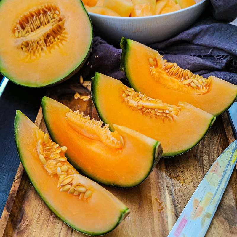 Repeatedly Cutting Cantaloupe In Half