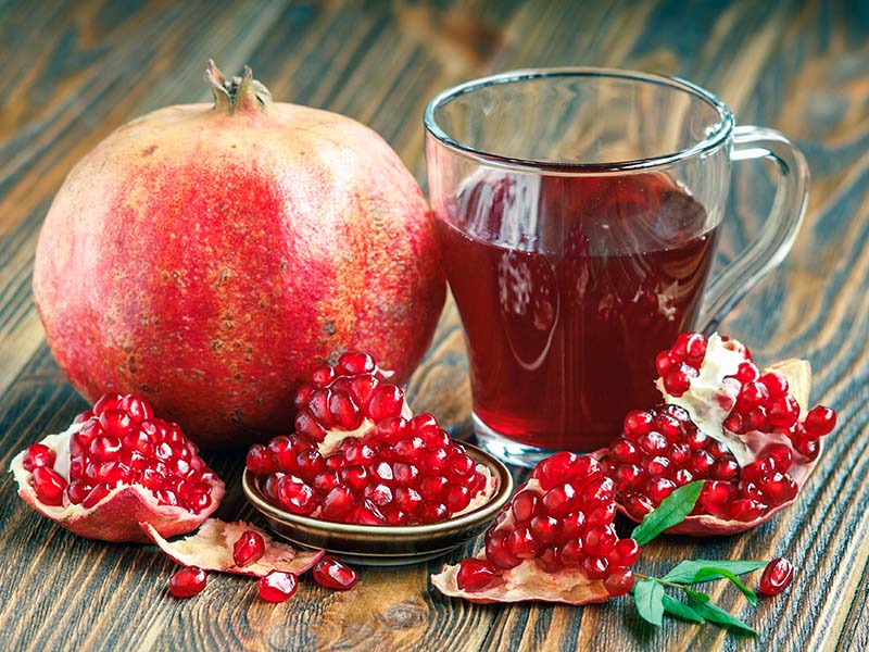 Drinking A Glass Pomegranate