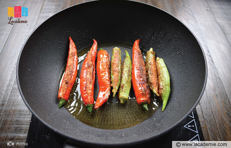 Fry The Okra And Peppers