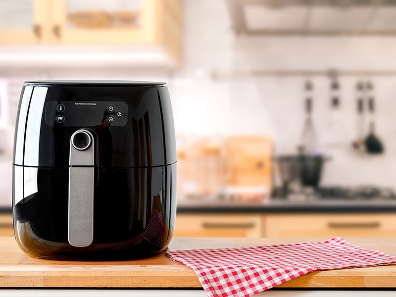 Air Fryer Pros and Cons on the table