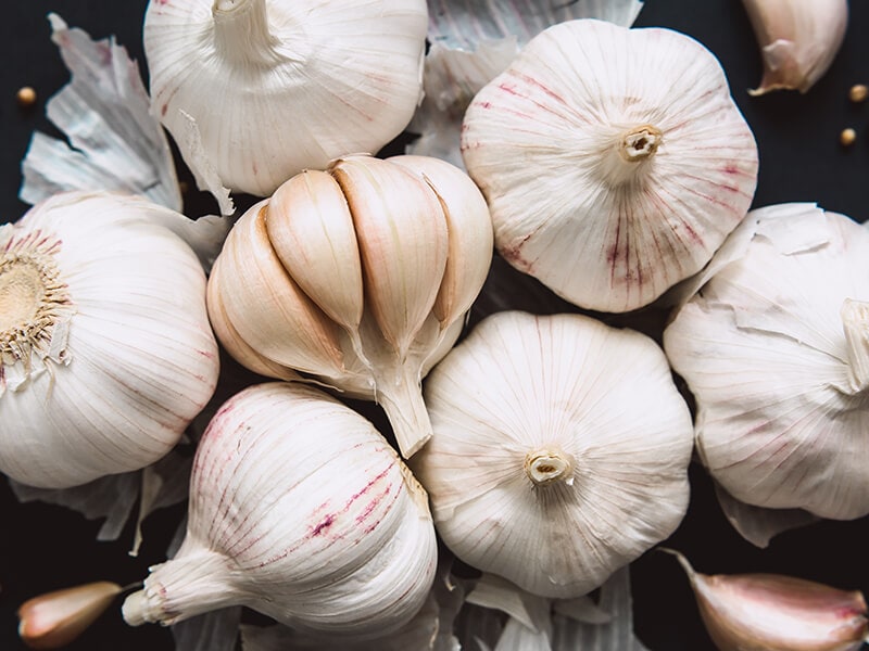 Garlic Bulbs On Black Background