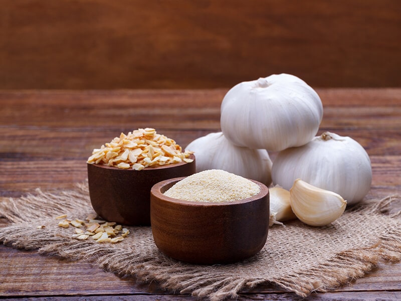 Ground Garlic Plate On Wooden