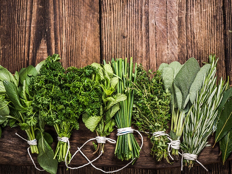 Bunch Fresh Herbs On Table