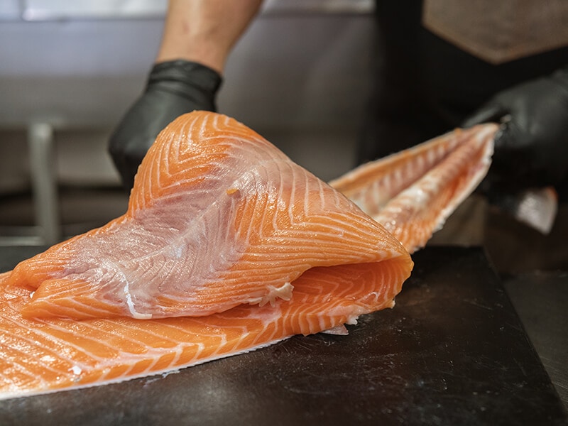 Chef Knife Discarding Salmon Skin