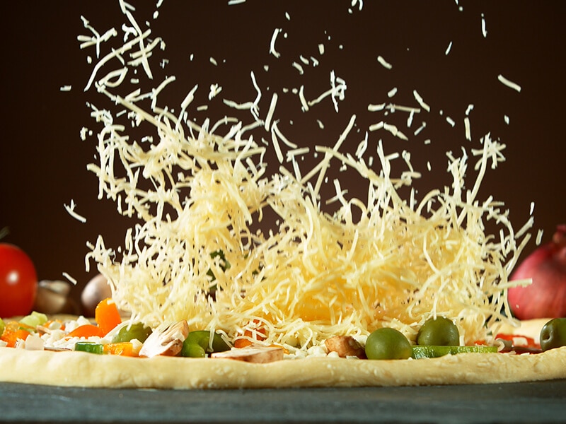 Falling Mozzarella Cheese On Pizza