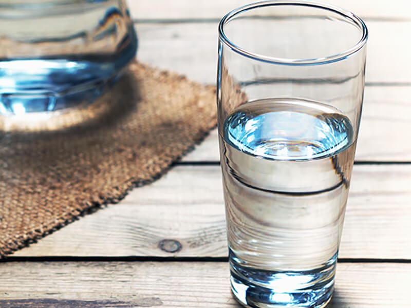 Glasses Water On Wooden Table