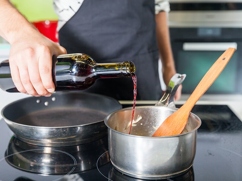 Man Chef Pouring Wine