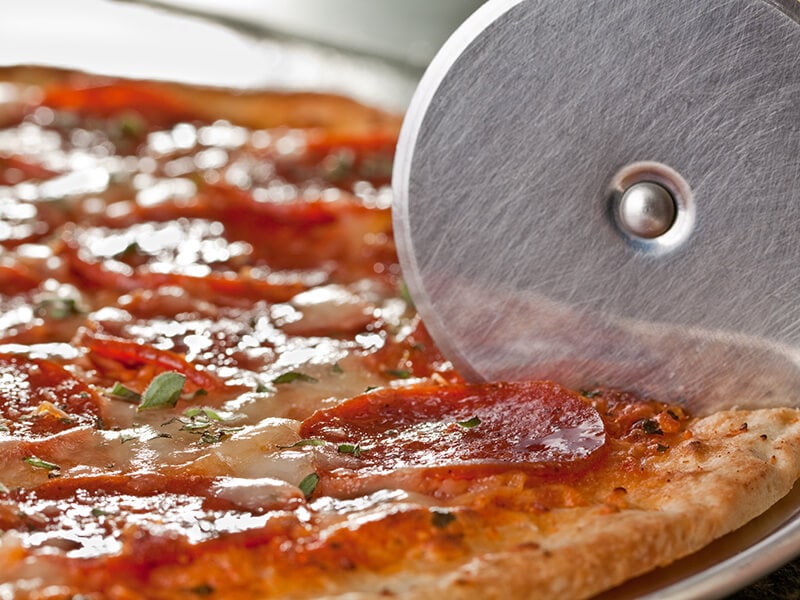 Pizza With Pizza Cutter