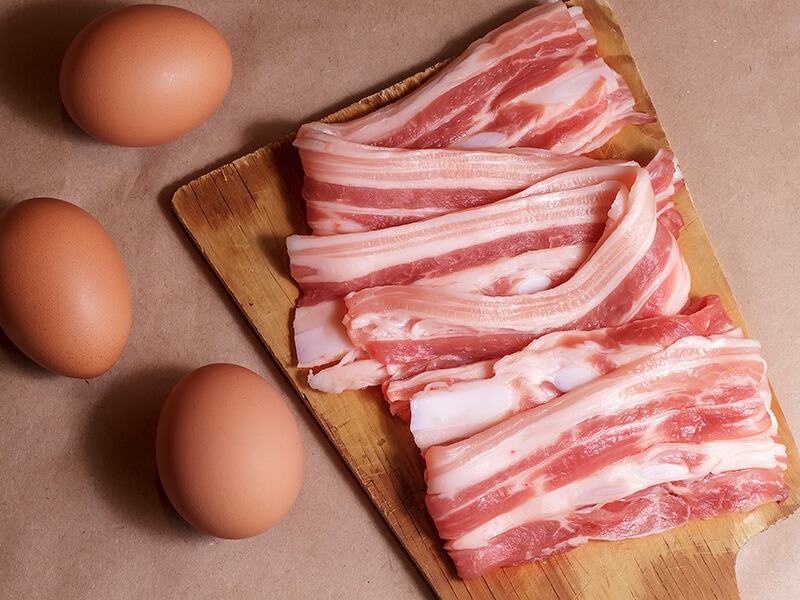 Raw Bacon And Eggs