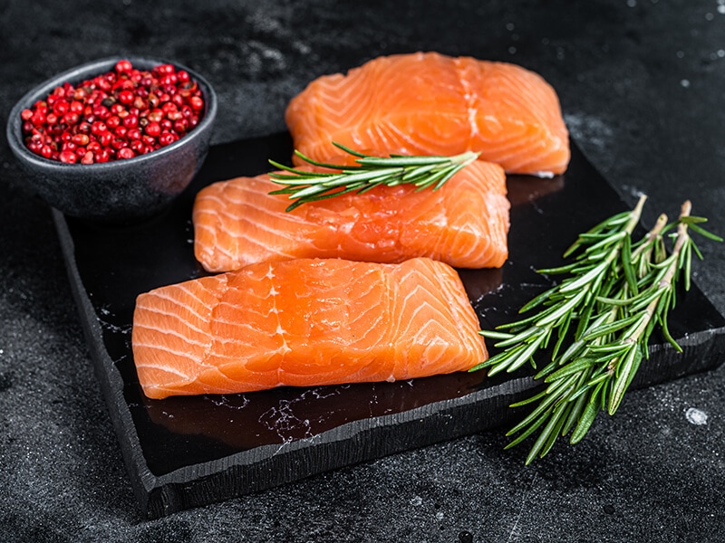 Salmon Fillet Steaks On Marble Board