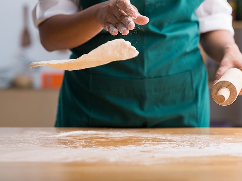 Tossing Rolling Out Dough