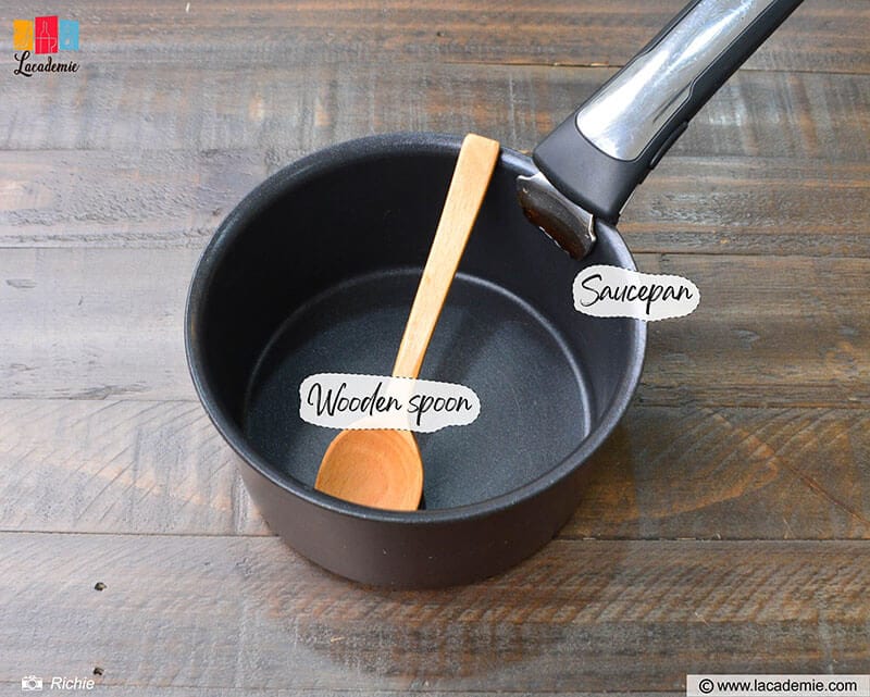 Wooden Spoon And Saucepan