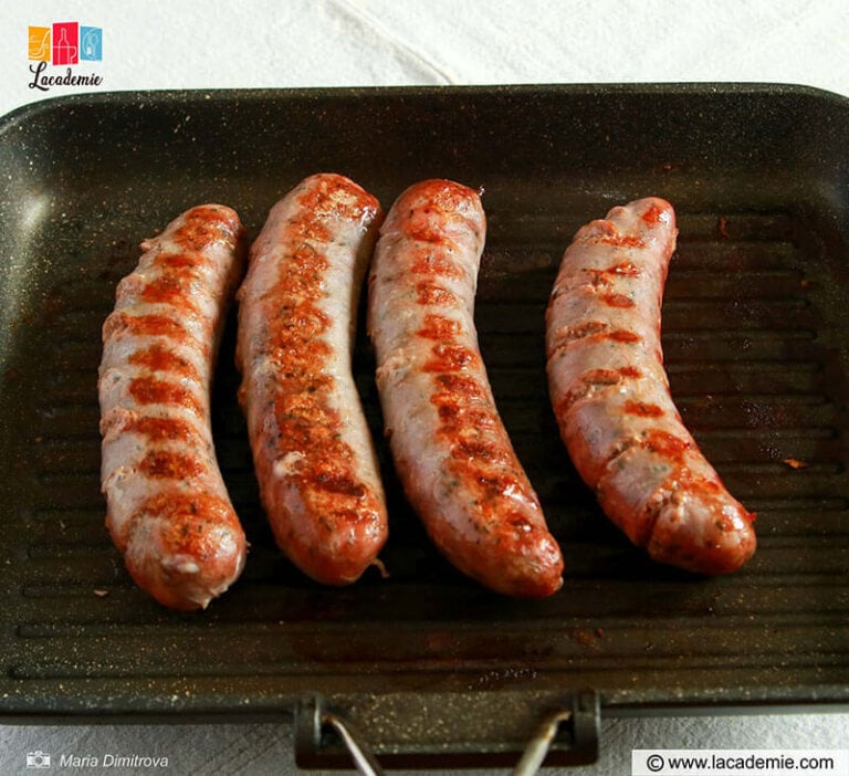 Place Sausages On The Grill